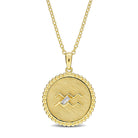 Yellow-plated sterling silver Capricorn zodiac pendant with white sapphire, detail view by Lord & Taylor