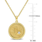 Yellow-plated sterling silver zodiac pendant necklace, close-up detail of sapphire by Lord & Taylor