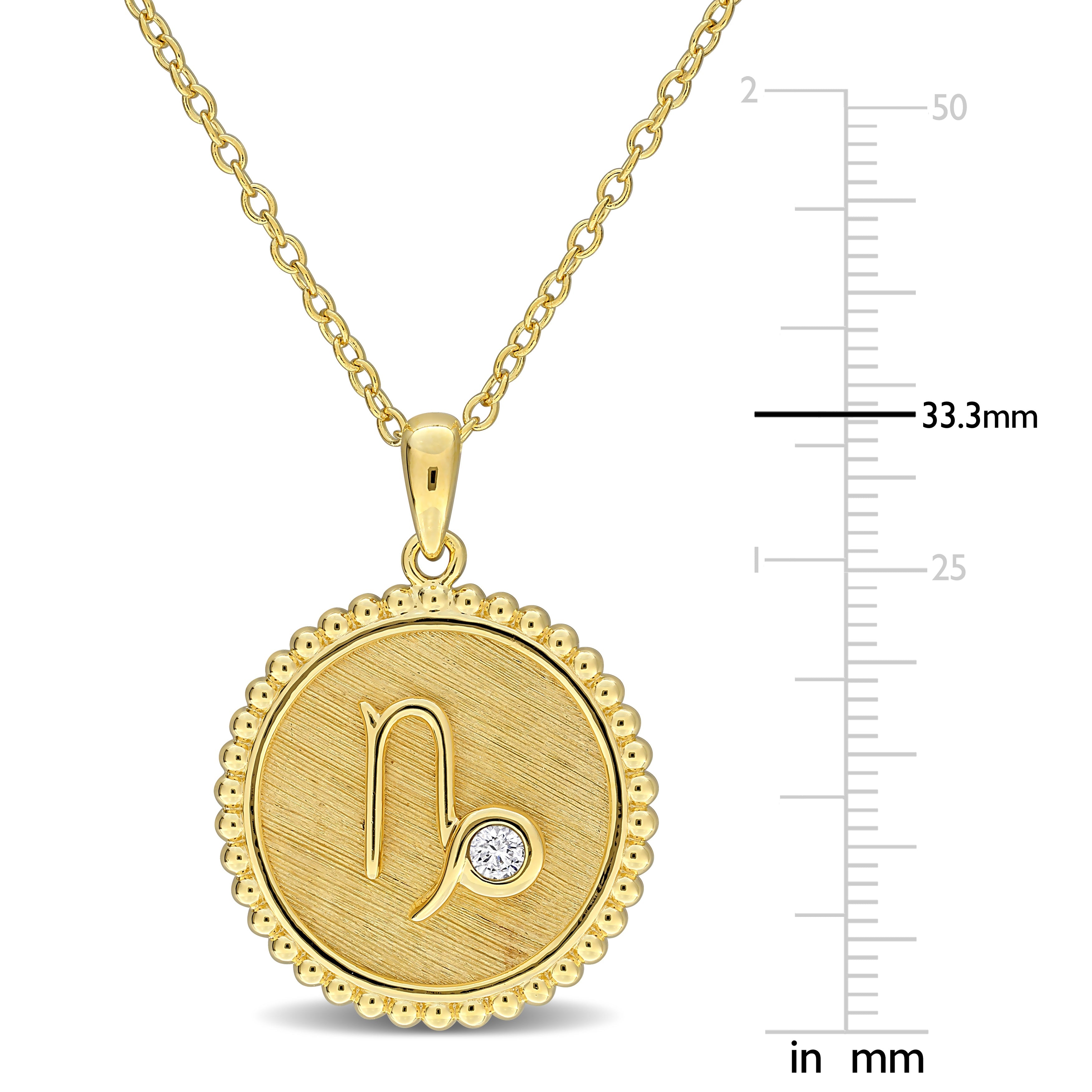 Yellow-plated sterling silver zodiac pendant necklace, close-up detail of sapphire by Lord & Taylor