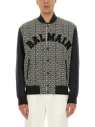 MONOGRAMMED VARSITY JACKET WITH PATCHES Balmain MULTICOLOUR 48
