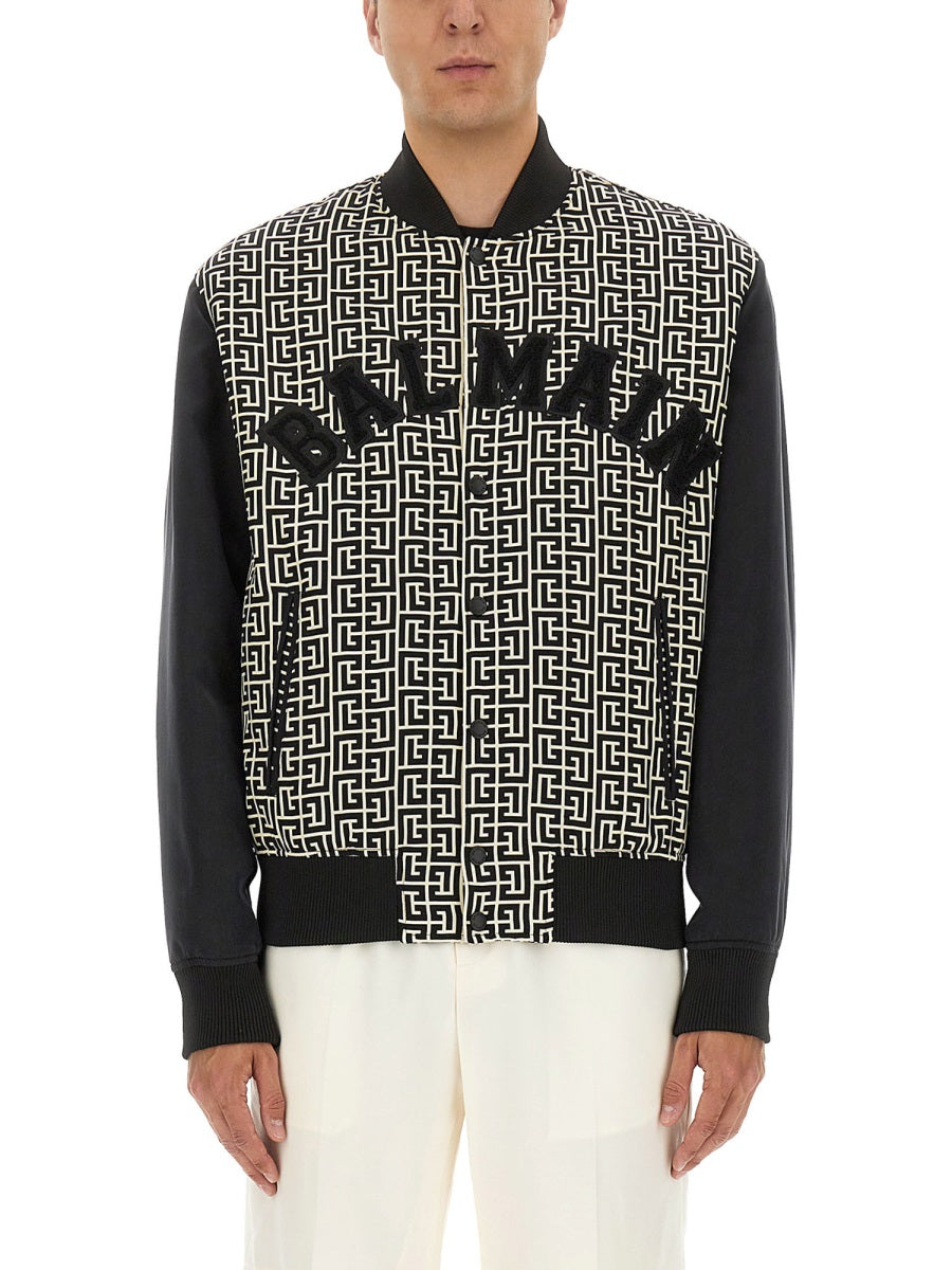 MONOGRAMMED VARSITY JACKET WITH PATCHES Balmain MULTICOLOUR 48