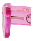 Pink translucent injection frame sunglasses by Gucci, temple view