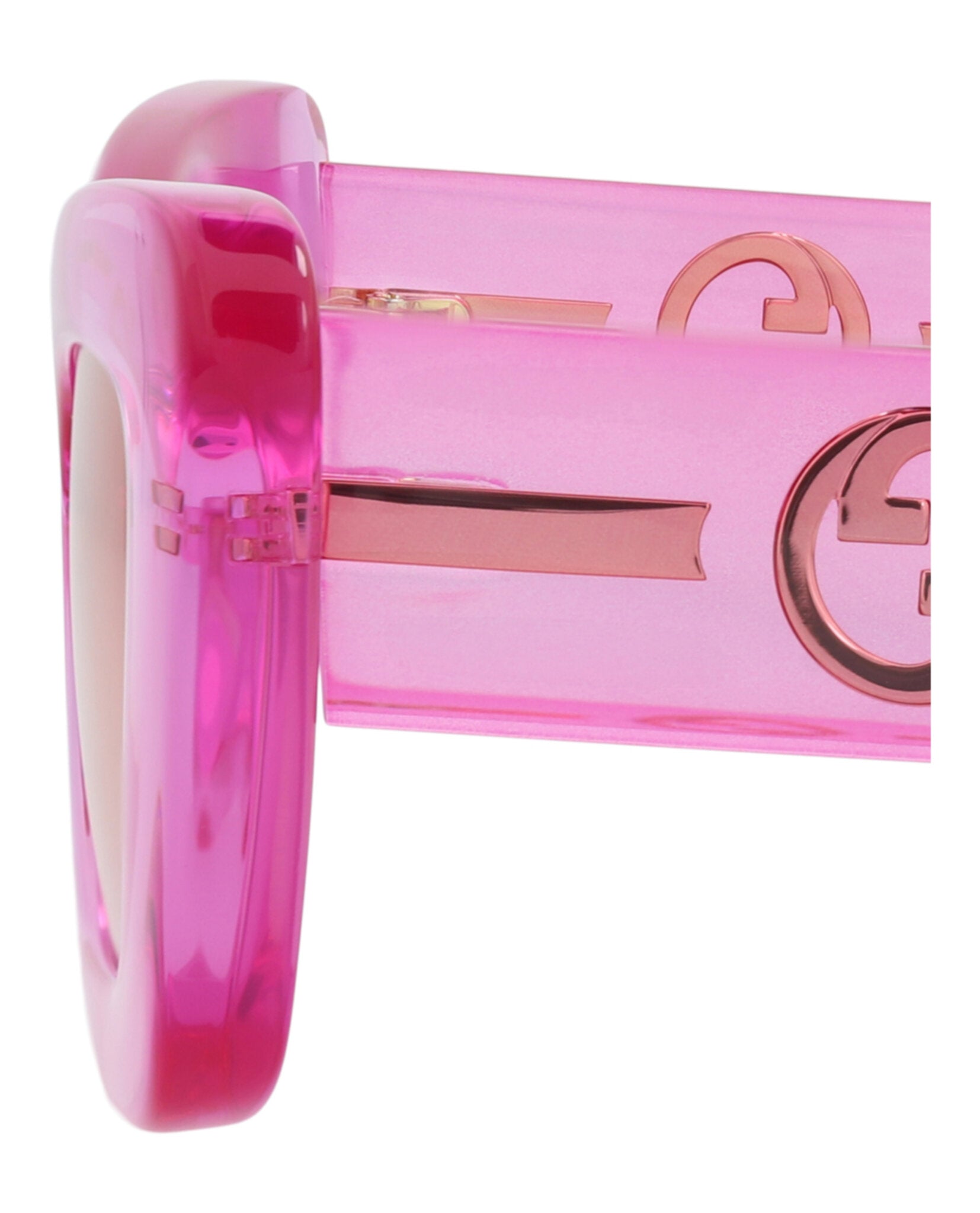 Pink translucent injection frame sunglasses by Gucci, temple view