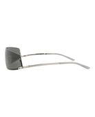 Gucci geometric shield sunglasses in grey metal, angled view