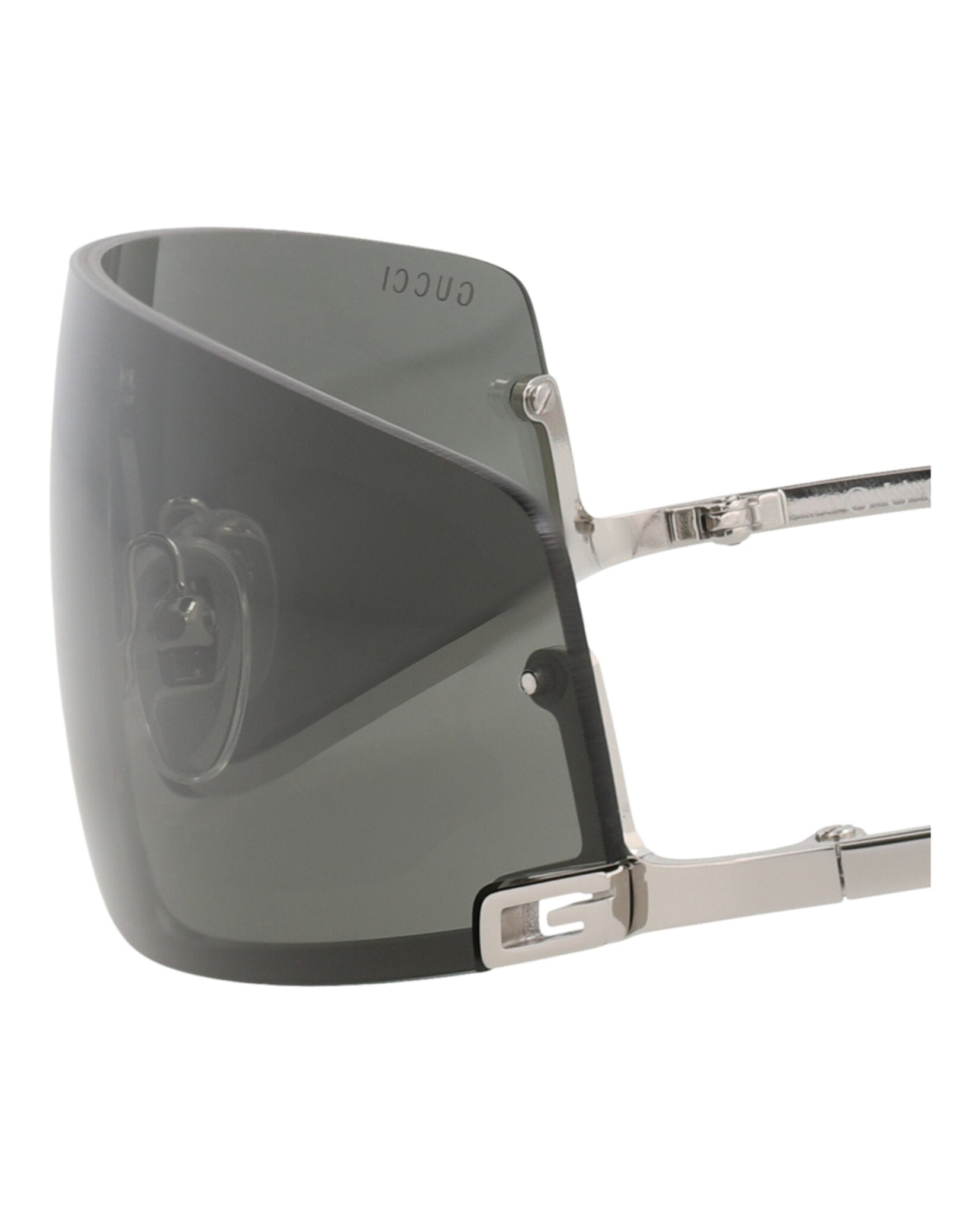 Grey metal shield-frame sunglasses by Gucci, top view showing nosepads