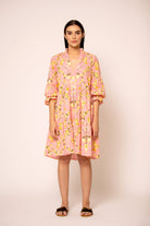 Beyond by Vera dress with pleated V-neckline detail, close-up view