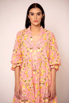 Pink and peach floral dress with billowing sleeves by Beyond by Vera, side view