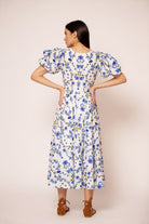 Midi wrap dress with bougainvillea-inspired print, side view