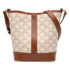 Beige Celine Small Triomphe bucket bag in coated canvas, front view