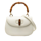 White Gucci Bamboo Night satchel with bamboo handle, front view by Gucci