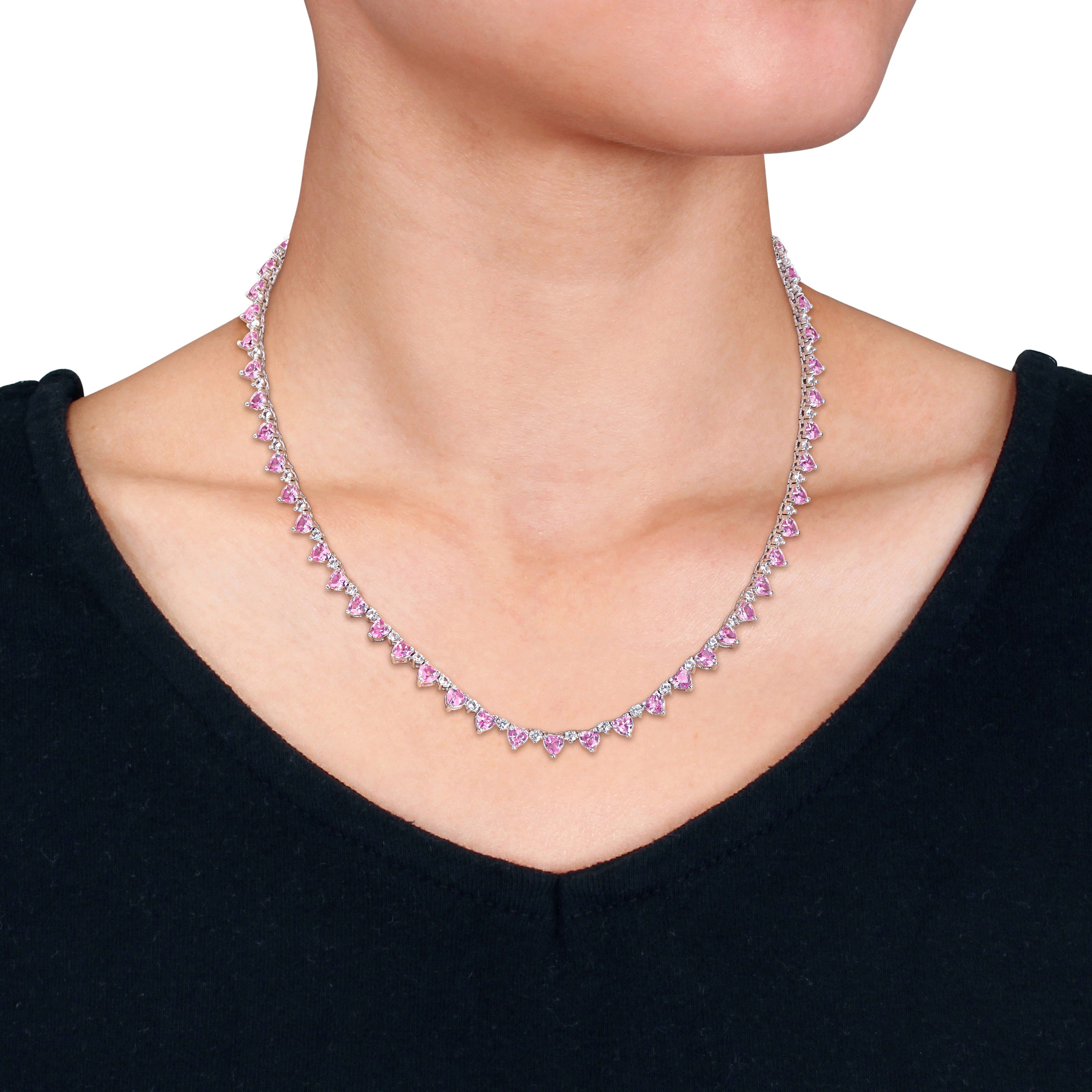 Pink sapphire heart tennis necklace close-up of heart-shaped stones by Lord & Taylor