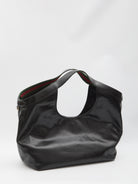 Black Gucci Giglio tote bag with light gold-tone hardware, side angle