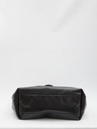 Black Gucci Giglio tote bag interior with GG fabric lining and pouch