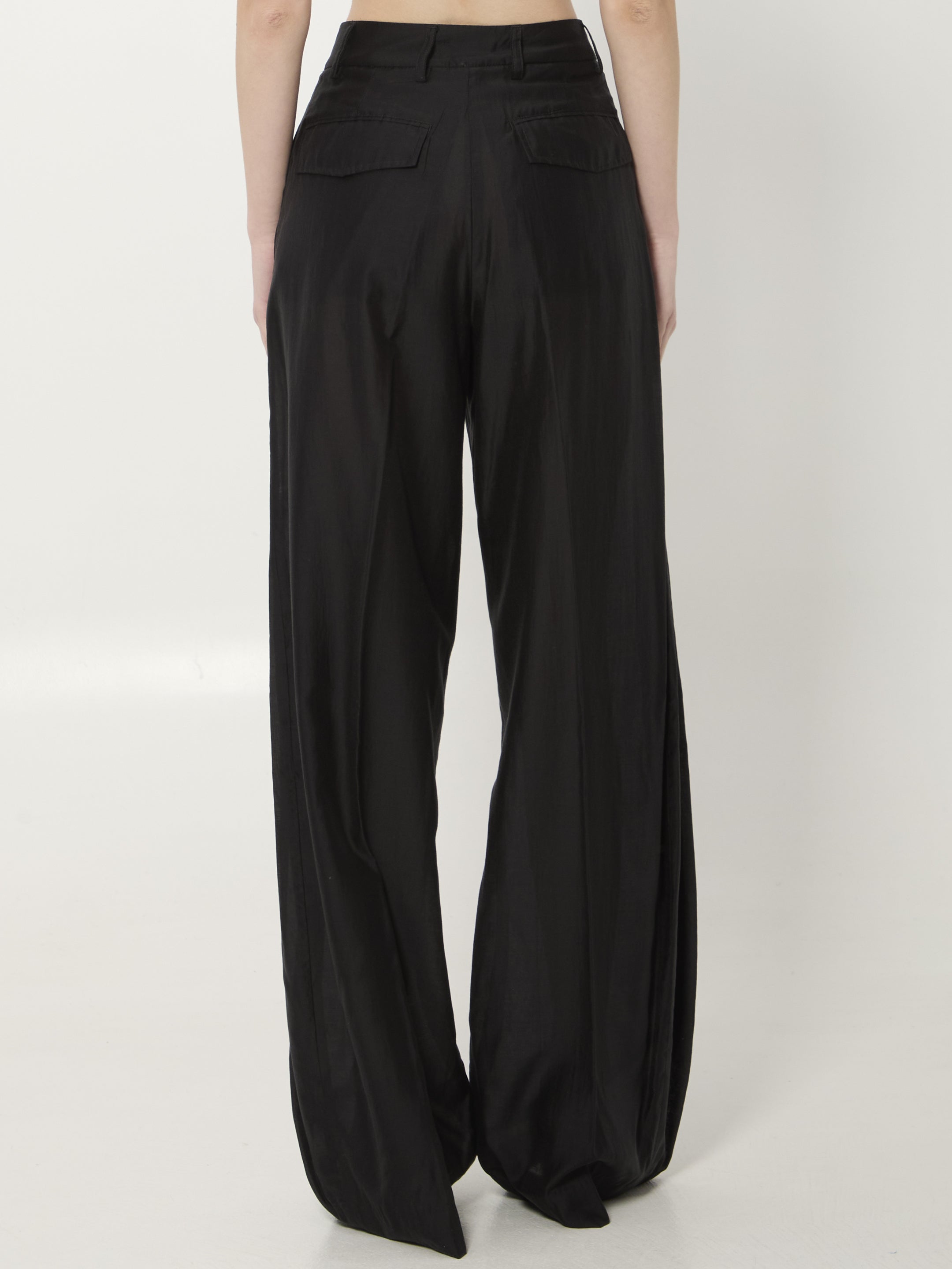 Black muslin Billie trousers by THE LATEST showing waistband detail with belt loops