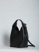 Black Celine small hobo bag with removable shoulder strap, side angle