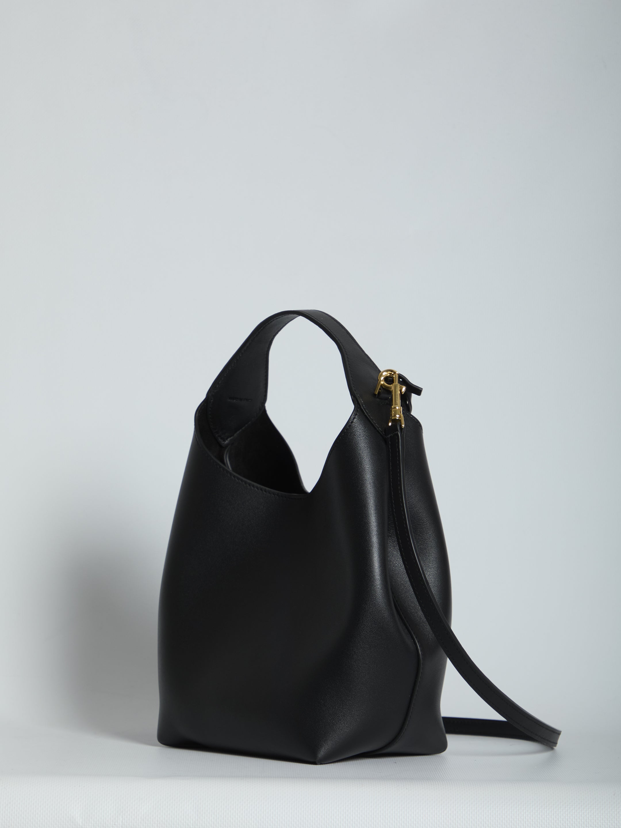 Black Celine small hobo bag with removable shoulder strap, side angle
