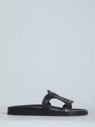 Black Celine Triomphe slide sandal with oversize logo, top view