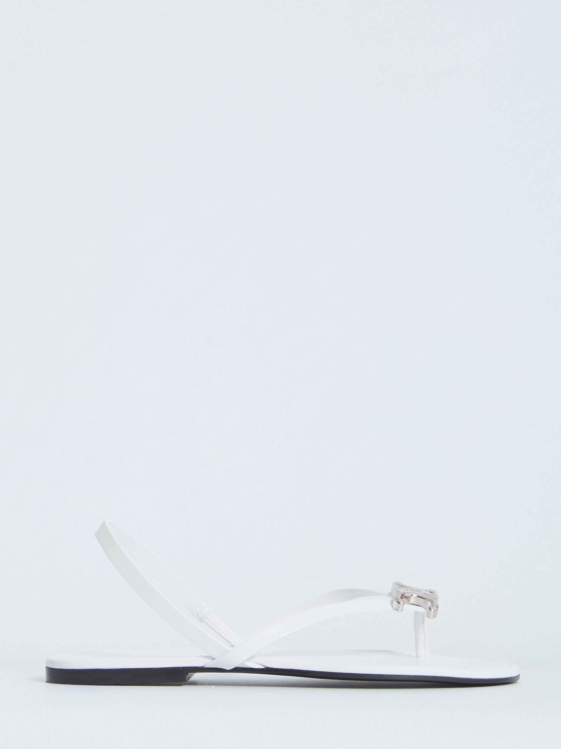 White calf leather slider sandals with Triomphe detail by Celine, side view