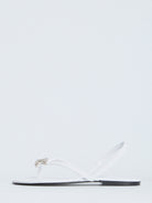 White Celine slider sandals with almond toe and TPU Triomphe detail, top view