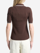 Brown Moncler cotton polo shirt showing point collar and three-button placket detail