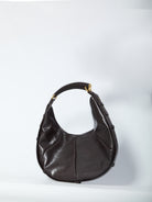 Brown quilted calfskin Mombasa shoulder bag by Saint Laurent, side view