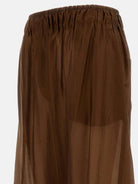 Brown wide-leg pants by THE LATEST with patch pockets, back view