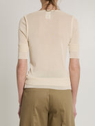 Pink Lemaire seamless top with double hem detail, close-up view