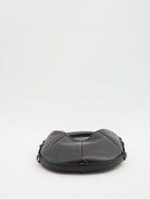 Black quilted calfskin Mombasa shoulder bag by Saint Laurent, back view with snap closure