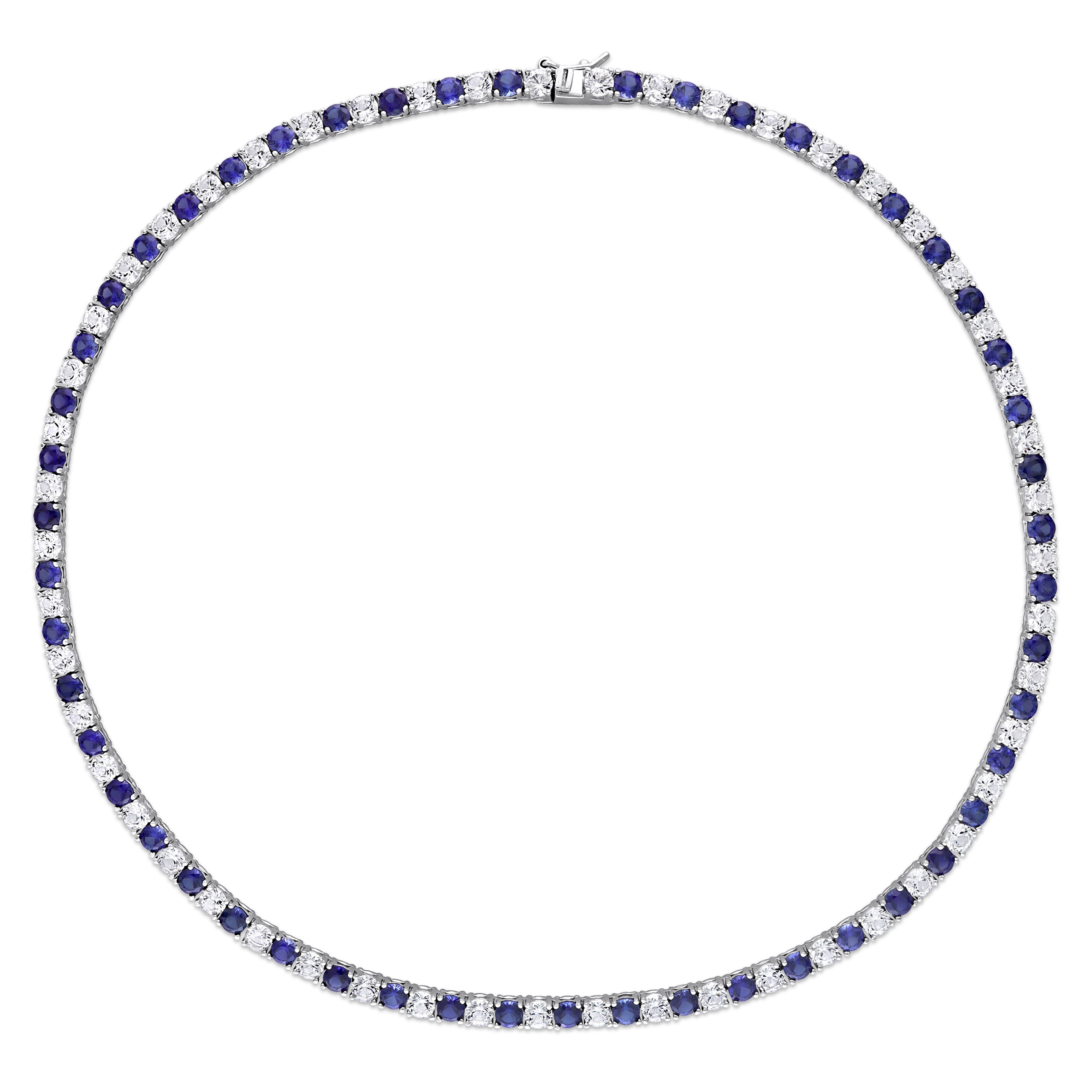 Blue and white sapphire tennis necklace, detailed overhead view of gemstone arrangement