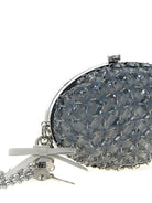Self Portrait clutch with removable chain shoulder strap, side view showing pendant detail