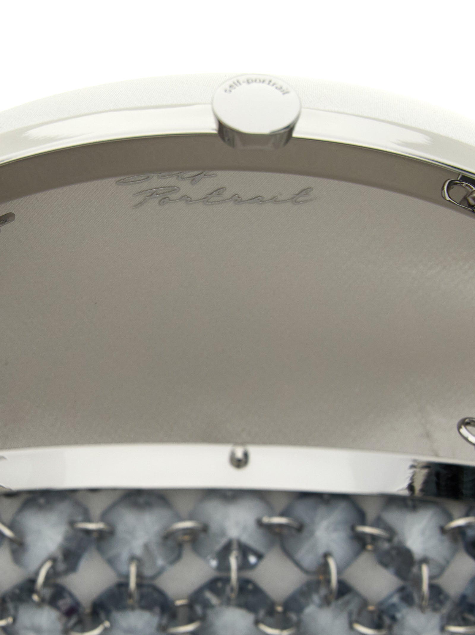 Grey satin clutch by Self Portrait showing Crystal Chain beaded detail, close-up view