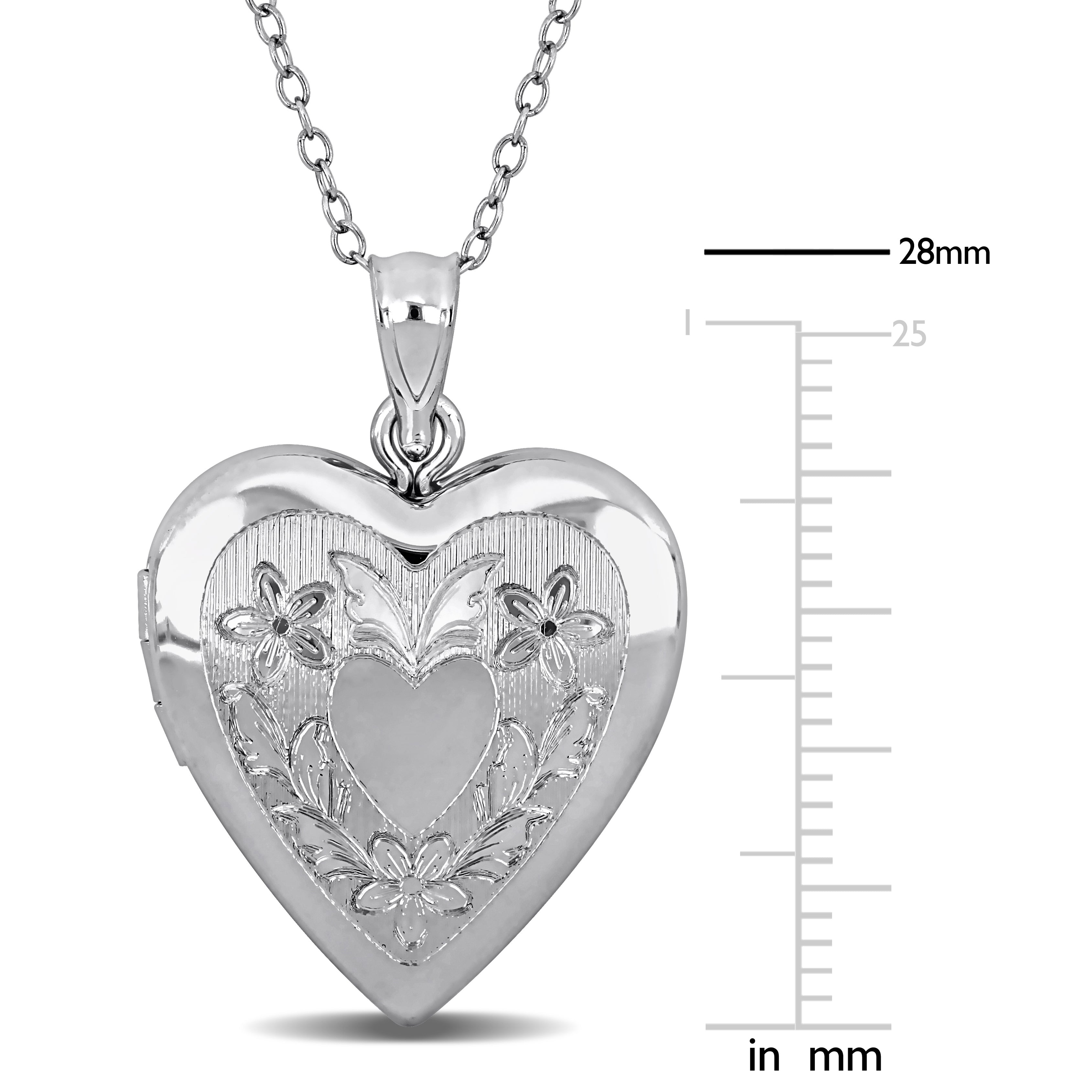 Sterling silver heart locket pendant necklace with floral design, detail of engraving