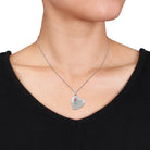 Sterling silver heart locket necklace on 18-inch cable chain, full length view