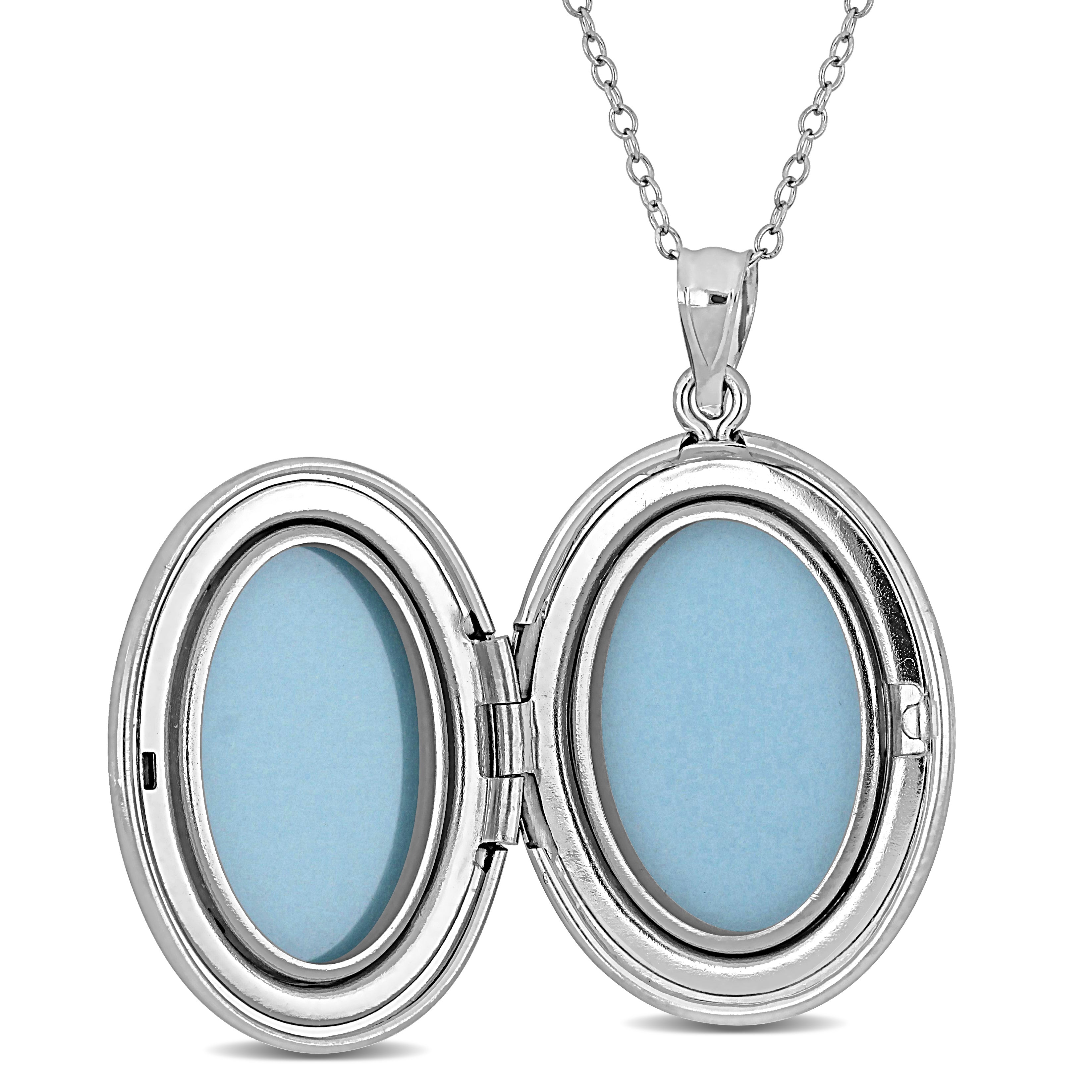 Sterling silver oval locket necklace shown open, interior view by Lord & Taylor