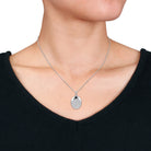 Sterling silver oval locket pendant detail with engraved text by Lord & Taylor