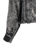 R13 Bubble shirt detail showing button cuffs and bandana print pattern