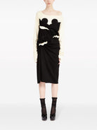 Black and off-white Maison Margiela midi dress showing signature numbers motif detail