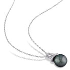 Black Tahitian pearl drop earrings with diamond pavé detail, close-up view