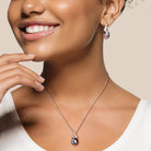 Black Tahitian pearl necklace and earring set worn, lifestyle view