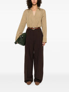 PLEATED TROUSERS WITH POCKETS THE LATEST