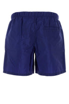 ELECTRIC BLUE RE-NYLON SWIMMING SHORTS Prada
