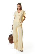 Yellow linen blend camp shirt with notch collar, styled view