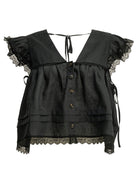Black GANNI linen blouse with V-neckline and bell sleeves, front view