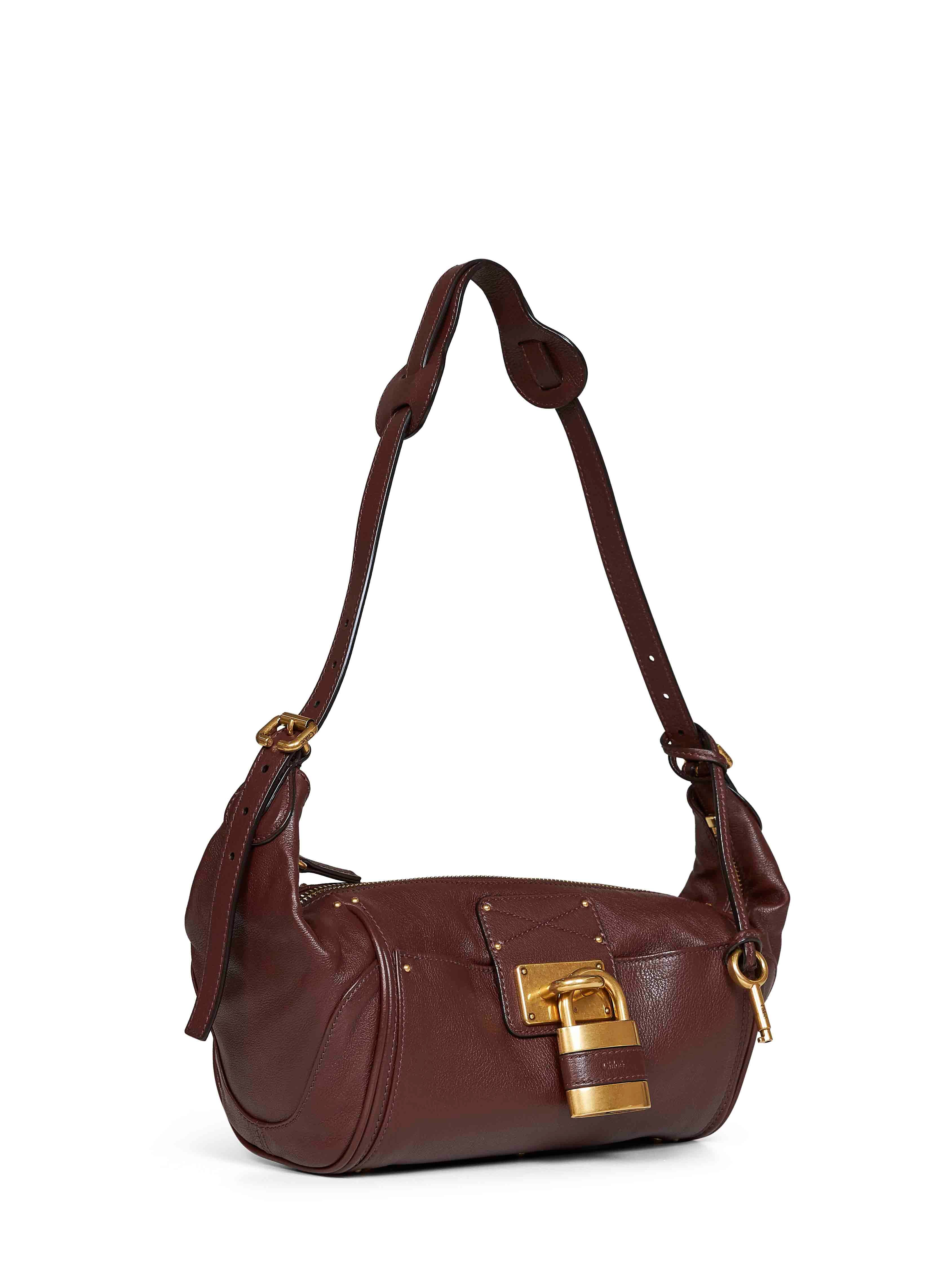 Brown Chloé Paddington crossbody bag showing adjustable leather strap detail