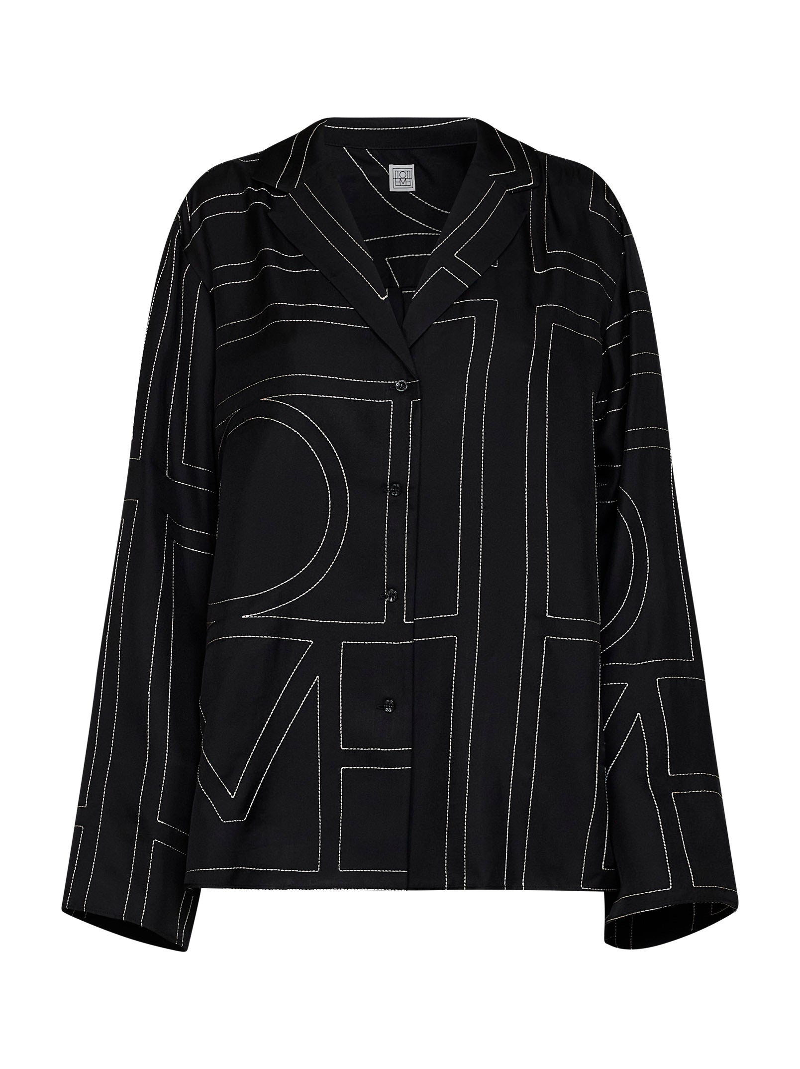 Black TOTEME silk pajama shirt with embroidered monogram, front view