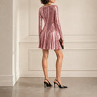 Rose gold pink sequined mini dress by Versace Jeans Couture, back detail view