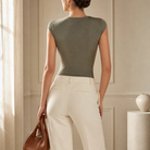 Olive green draped bodysuit back view showing gathered shoulders by Lord & Taylor Heritage