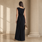 Black asymmetric jersey maxi gown back view showing draped silhouette by Lord & Taylor Heritage