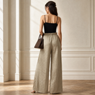 Mink wide-leg trousers crinkled metallic fabric detail, back view
