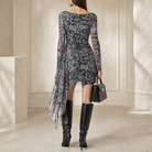Black animal print mesh dress back view showing sheer long sleeves by Lord & Taylor Heritage